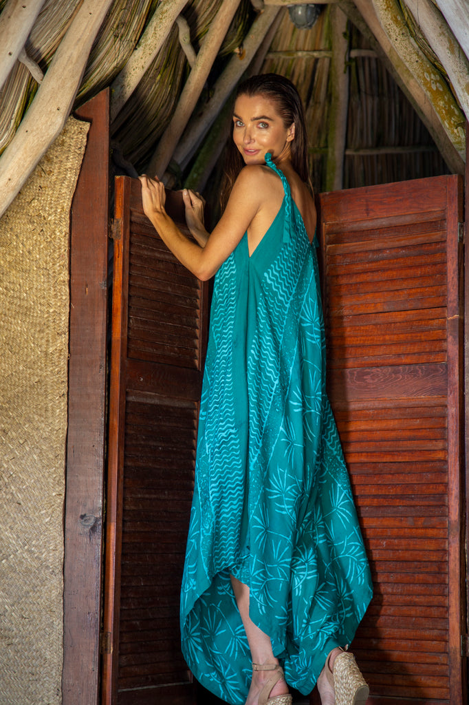 Woman wearing Gypsy Jumpsuit in Batik Bora Bora Teal Mint Palm