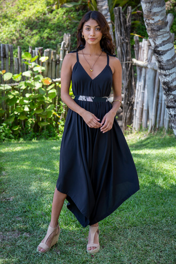 Woman wearing Gypsy Jumpsuit in Premium Santorini Solid Black (Accessories not included).