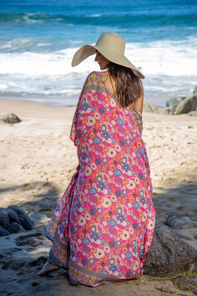 Woman wearing  Samantha Kaftan Robe in Premium Okinawa Coral