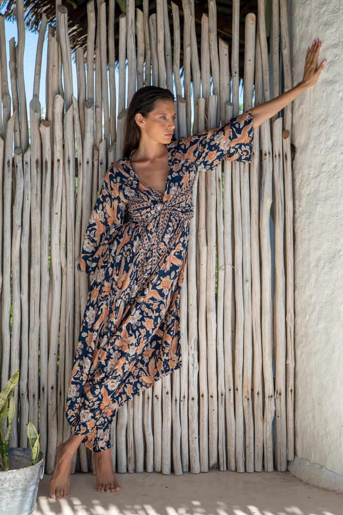 Faye Dunaway Long Sleeve Cropped Wrap Top modeled in Turks and Caicos print