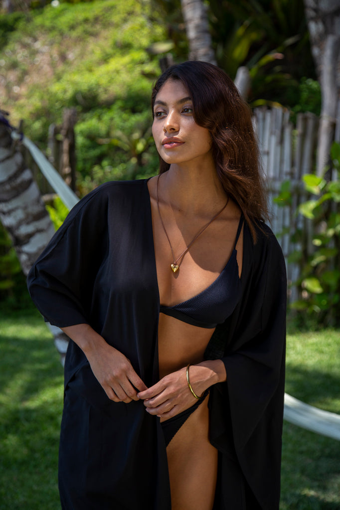 Woman wearing  Samantha Kaftan Robe in Premium Solid Black