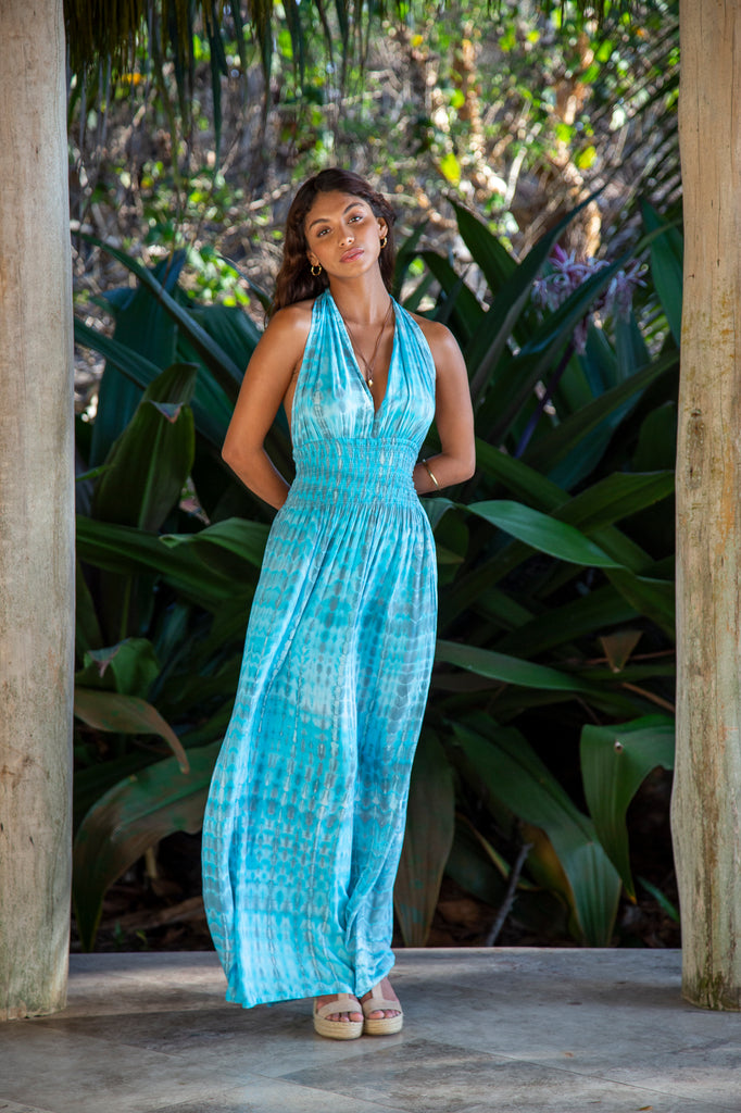 Front of a Woman standing wearing Sophia Loren Turquoise Tammy Infinity Dress OS in front of a forest.